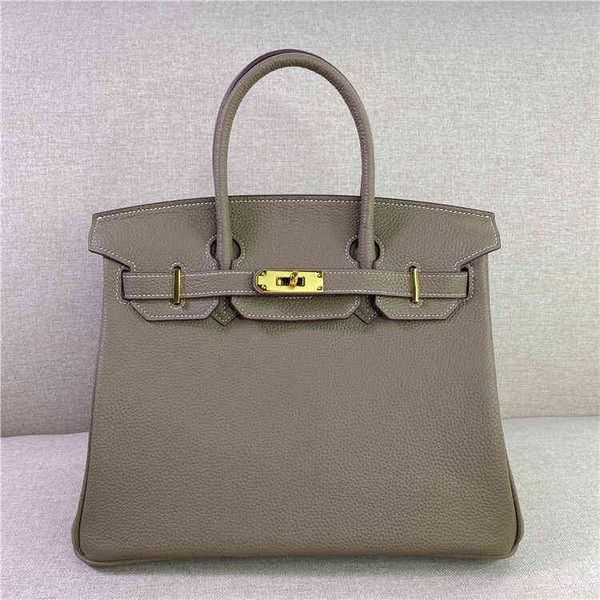 designer birkiins bags2022 new cowhide litchi pattern platinum bag women's buckle fashion large capacity arrival vintage charm
designer birkiins bags2022 new cowhide litchi pattern platinum bag women's buckle fashion large capacity arrival vintage charm