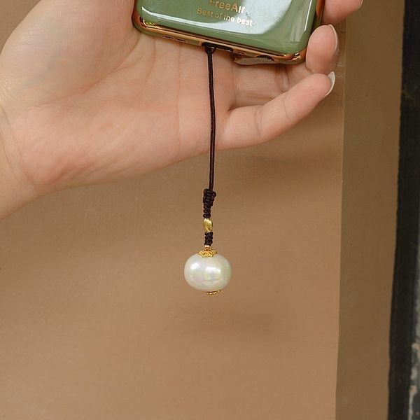 short korean rope mobile phone pendant pearl simple hanging versatile accessories girl heart modern sling chain
short korean rope mobile phone pendant pearl simple hanging versatile accessories girl heart modern sling chain