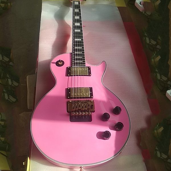 jacey guitar store customized pink guitar with ebony fretboard, floyd rose tremolo, belly cut
jacey guitar store customized pink guitar with ebony fretboard, floyd rose tremolo, belly cut