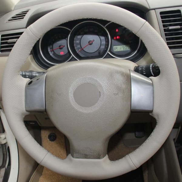 beige genuine leather hand-stitched car steering wheel cover for old tiida livina sylphy note1
beige genuine leather hand-stitched car steering wheel cover for old tiida livina sylphy note1