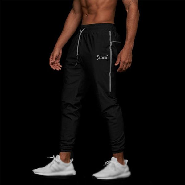 godlikeu autumn men's fitness trousers sports slim thin woven multifunctional towel button luminous jogging pants, Black
godlikeu autumn men's fitness trousers sports slim thin woven multifunctional towel button luminous jogging pants, Black