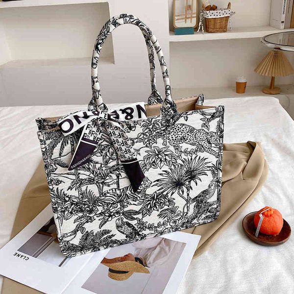 

2022 factory outlet lin shanshan's same tote women's graffiti spray painted canvas shoulder handbag 7qyy