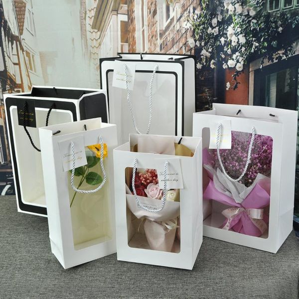 gift wrap flower paper handbags with transparent window packing gifts bouquets flowers candys bags for home party decoration
gift wrap flower paper handbags with transparent window packing gifts bouquets flowers candys bags for home party decoration