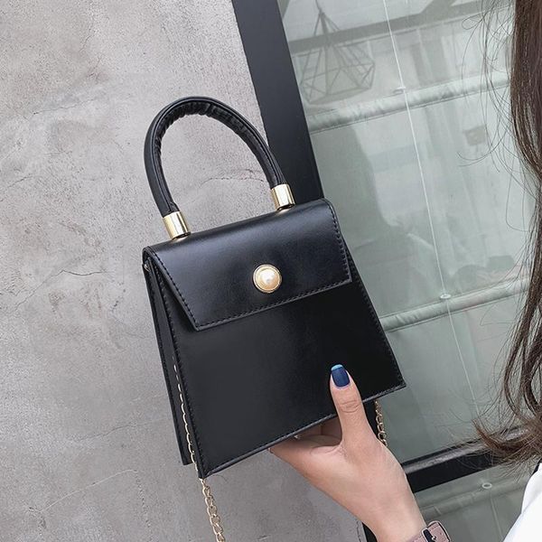 the new fashion pearl buckle hand-held small square bag with one shoulder slant chain bag
the new fashion pearl buckle hand-held small square bag with one shoulder slant chain bag