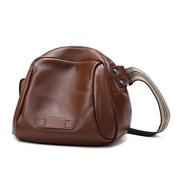 it is a wide-strap bag made of cow hide casual messenger bag for men and women a soft leather shell bags