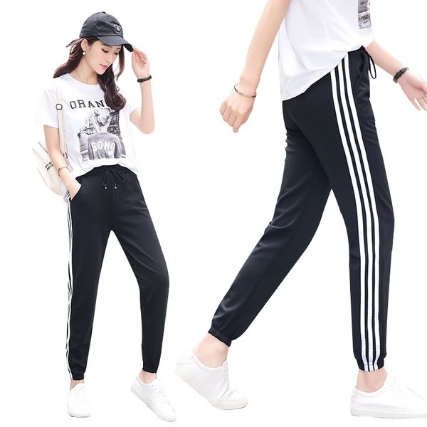 korean style female pants white black splice smellstripe loose leisure harem flare fashion pants streetwear trousers y200114, Black;white 
korean style female pants white black splice smellstripe loose leisure harem flare fashion pants streetwear trousers y200114, Black;white