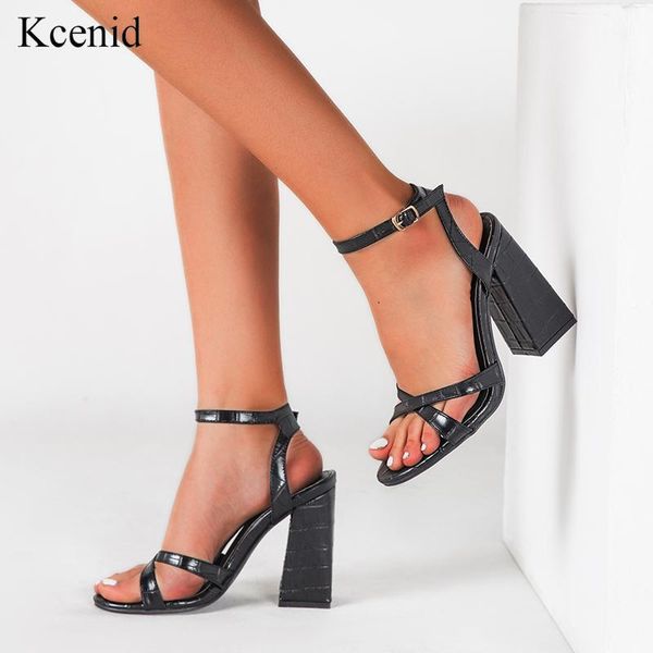 kcenid 2020 new pu leather black white buckle strap women's sandals shoes party square high heels open toe sandals size 421
kcenid 2020 new pu leather black white buckle strap women's sandals shoes party square high heels open toe sandals size 421