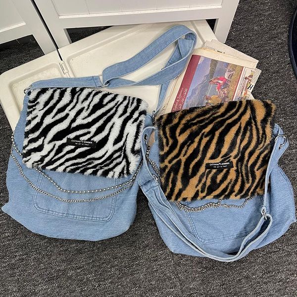 cross body real pos hong kong style niche zebra pattern wash jeans stitching chain design retro girl messenger bag shoulder 
cross body real pos hong kong style niche zebra pattern wash jeans stitching chain design retro girl messenger bag shoulder