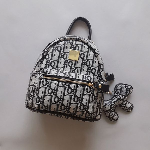 double shoulder messenger bag female d family letter printing mini pendant trend backpack pu leather waterproof bag
double shoulder messenger bag female d family letter printing mini pendant trend backpack pu leather waterproof bag
