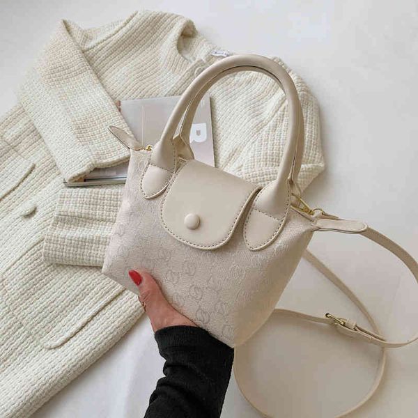 purse portable women's autumn new sling shoulder version printing diagonal bag
purse portable women's autumn new sling shoulder version printing diagonal bag