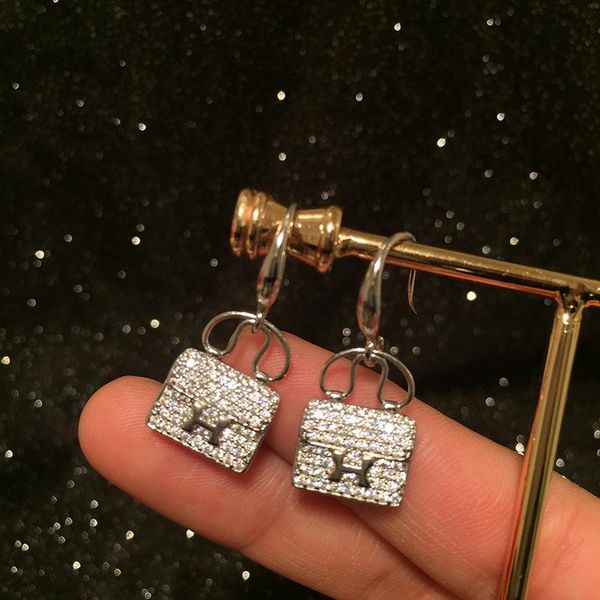 korean mini bag earring female luxury micro-inlaid zircon creative letter earring earhook network celebrity temperament, Silver
korean mini bag earring female luxury micro-inlaid zircon creative letter earring earhook network celebrity temperament, Silver