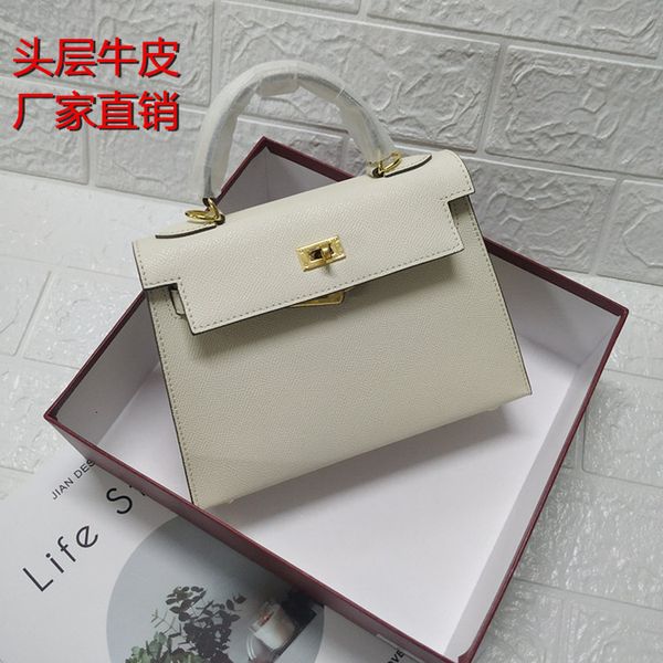 selling second generation head leather women's lock mini square hand print kelly bag
selling second generation head leather women's lock mini square hand print kelly bag