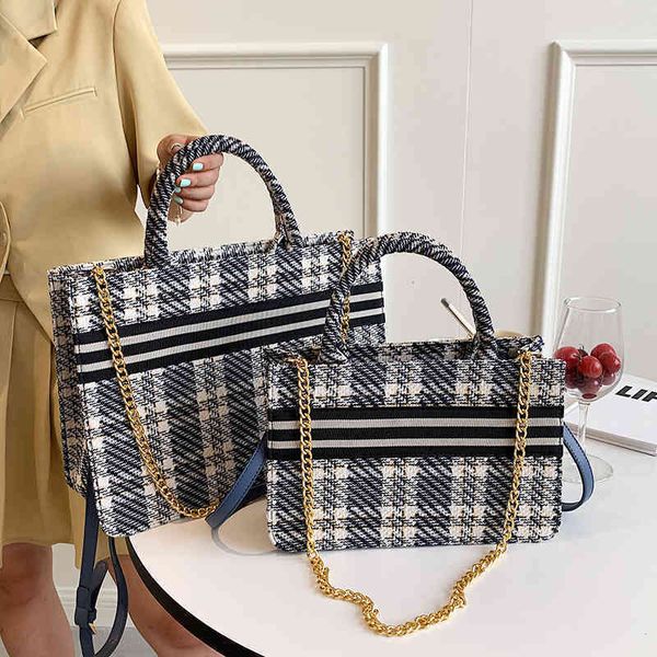 2022 latest models handbag wholesale direct female portable tote korean texture canvas lattice chain
2022 latest models handbag wholesale direct female portable tote korean texture canvas lattice chain