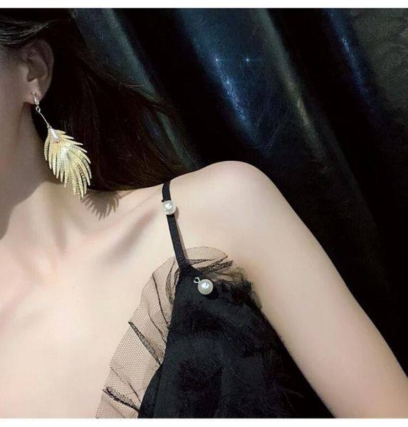 alloy feather earrings network reds simple long earrings fashion pendant drop water pearl women wedding gift, Silver
alloy feather earrings network reds simple long earrings fashion pendant drop water pearl women wedding gift, Silver