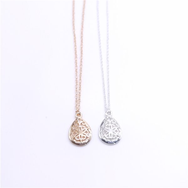 new trendy water drop shape pendant hollow-out flower craft jewelry fashion design european and american style women's necklace, Silver
new trendy water drop shape pendant hollow-out flower craft jewelry fashion design european and american style women's necklace, Silver