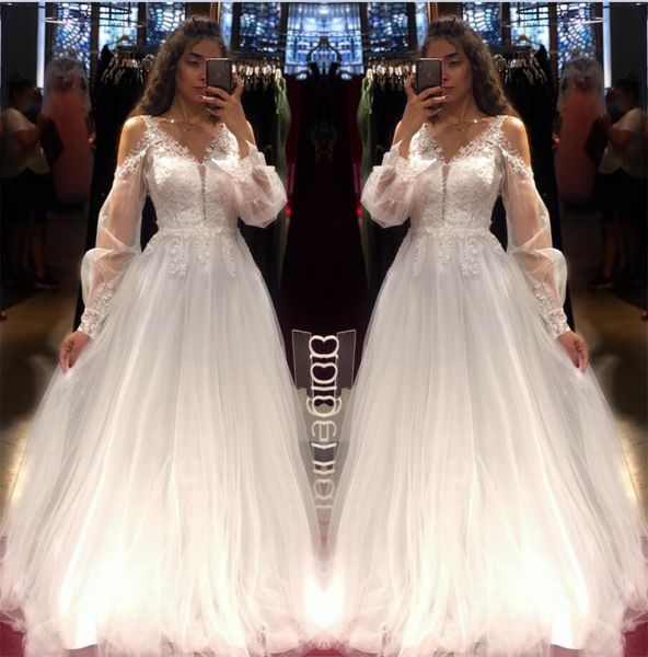 soft tulle 2021 a line wedding dresses lace appliqued off the shoulder long sleeves bridal gowns floor lenght summer garden marriage lady, White
soft tulle 2021 a line wedding dresses lace appliqued off the shoulder long sleeves bridal gowns floor lenght summer garden marriage lady, White