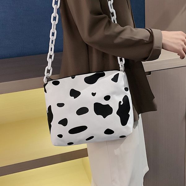 casual acrylic chains cow pattern women shoulder bags designer canvas crossbody bag cute dot large capacity totes lady big purse c1016
casual acrylic chains cow pattern women shoulder bags designer canvas crossbody bag cute dot large capacity totes lady big purse c1016