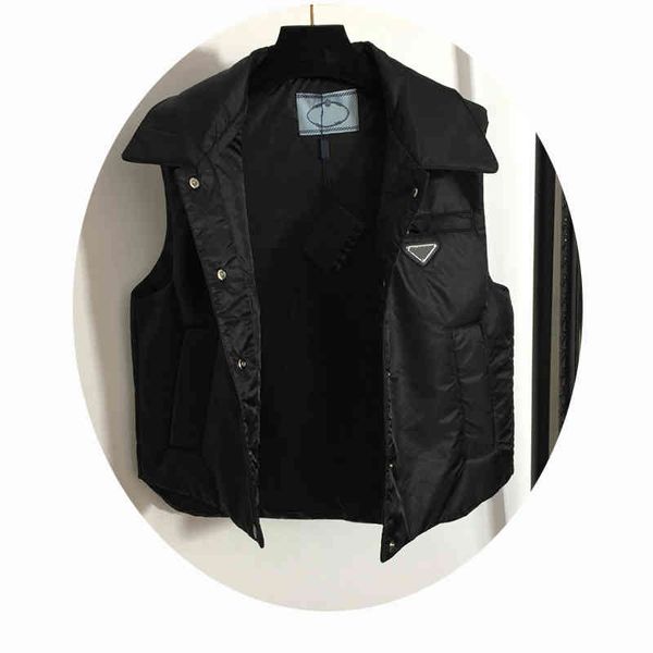 men's vests brand men women winter sleeveless designer jacket trendy triangle badge couple warm vest coat poig, Black;white
men's vests brand men women winter sleeveless designer jacket trendy triangle badge couple warm vest coat poig, Black;white