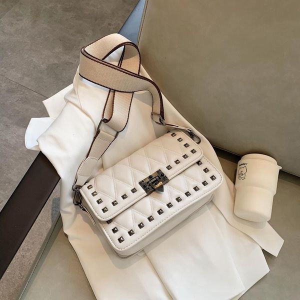 luxury designer female bag 2020 summer new shoulder bag fashion messenger rivet female lock small square ladies
luxury designer female bag 2020 summer new shoulder bag fashion messenger rivet female lock small square ladies