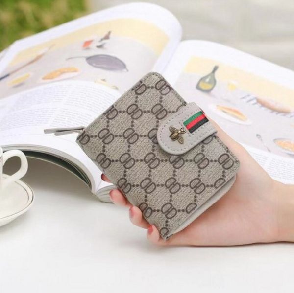 european and american retro versatile wallet women's short style zipper small pocket wallet, Black
european and american retro versatile wallet women's short style zipper small pocket wallet, Black