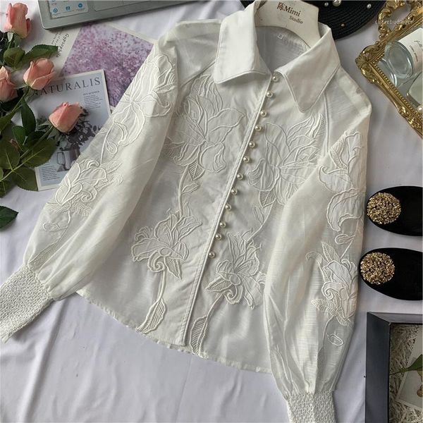 new spring women elegant pearl button embroidered floral shirt white blouse female lady single-breasted long sleeve blouse 1
new spring women elegant pearl button embroidered floral shirt white blouse female lady single-breasted long sleeve blouse 1