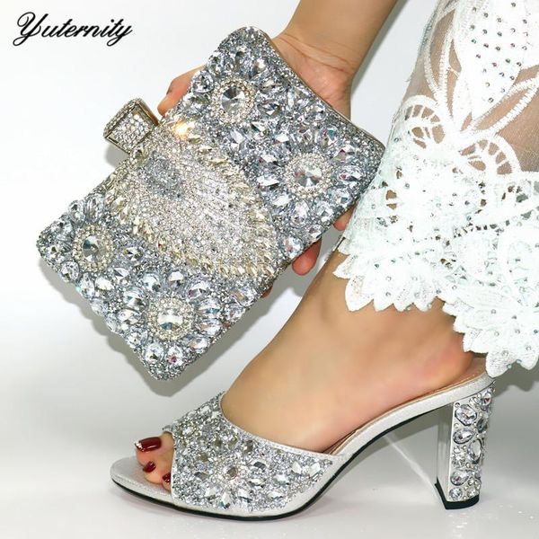 silver color italian crystal woman shoes and bag set fashion african high heels shoes and bag set for wedding party size 39-43, Black
silver color italian crystal woman shoes and bag set fashion african high heels shoes and bag set for wedding party size 39-43, Black