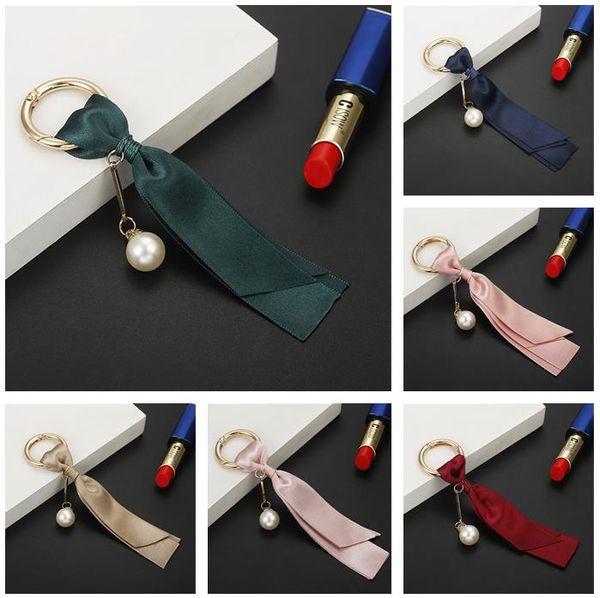 new creative designer keychain fashion bag tassel pendant korean ribbon diy jewelry accessories pearl satin keychain jewelry gift, Silver
new creative designer keychain fashion bag tassel pendant korean ribbon diy jewelry accessories pearl satin keychain jewelry gift, Silver