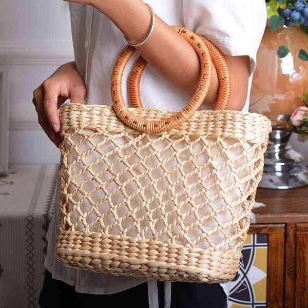 shopping bags handmade hollow women's handbags summer woven beach bohemian straw designer luxury round handle shopper female 220301
shopping bags handmade hollow women's handbags summer woven beach bohemian straw designer luxury round handle shopper female 220301