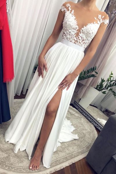 beach princess wedding dresses 2021 lace appliques sheer neck cap short sleeves side slit wedding gowns lace bodice robe de mariee, White
beach princess wedding dresses 2021 lace appliques sheer neck cap short sleeves side slit wedding gowns lace bodice robe de mariee, White