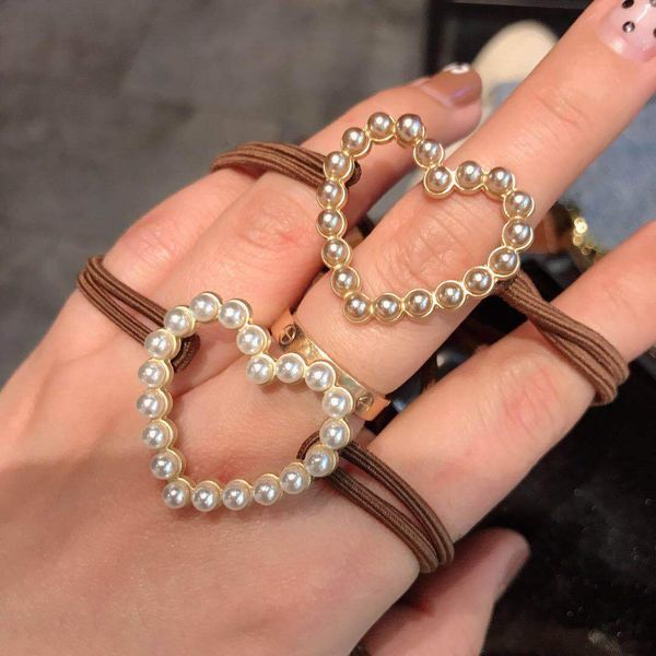 guodong gate same style hair rope female pearl heart hair rope internet celebrity hair accessories small clear heart simple tie rubber, Golden;white
guodong gate same style hair rope female pearl heart hair rope internet celebrity hair accessories small clear heart simple tie rubber, Golden;white