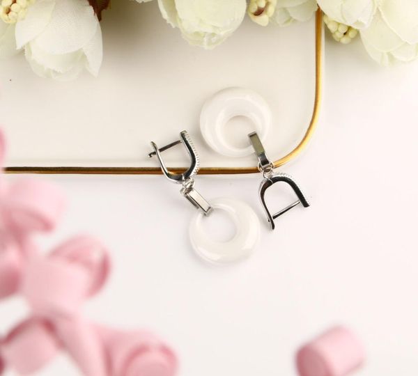 simple style female earrings set smooth white hollow circle ceramics studs earring statement ear brinco jewelry party22, Golden;silver
simple style female earrings set smooth white hollow circle ceramics studs earring statement ear brinco jewelry party22, Golden;silver
