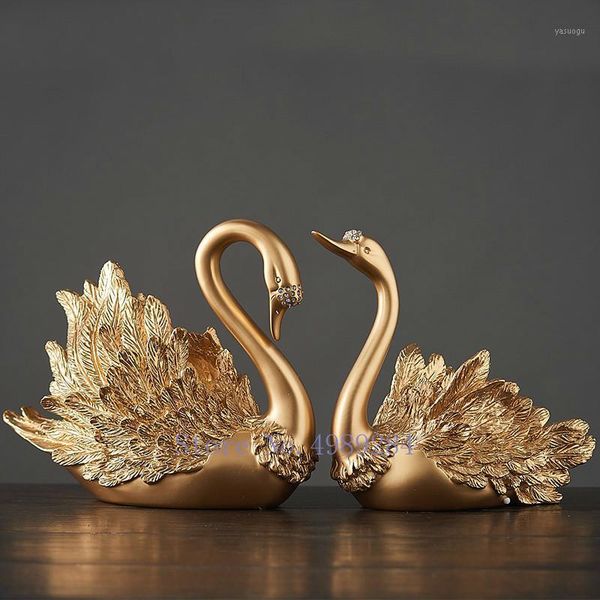 nordic creative resin gold swan couple crafts ornaments modern home decoration accessories figurines christmas gift home decor1
nordic creative resin gold swan couple crafts ornaments modern home decoration accessories figurines christmas gift home decor1