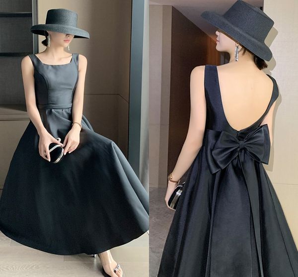 black a-line ankle length prom dresses abendkleider dubai backelss formal party dress bow satin simple evening gown robe de soiree 2022 
black a-line ankle length prom dresses abendkleider dubai backelss formal party dress bow satin simple evening gown robe de soiree 2022