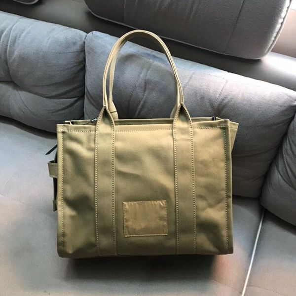 2020 new women's simple fashion single shoulder diagonal straddle portable canvas women's bag shopping bag travel bag for women
2020 new women's simple fashion single shoulder diagonal straddle portable canvas women's bag shopping bag travel bag for women