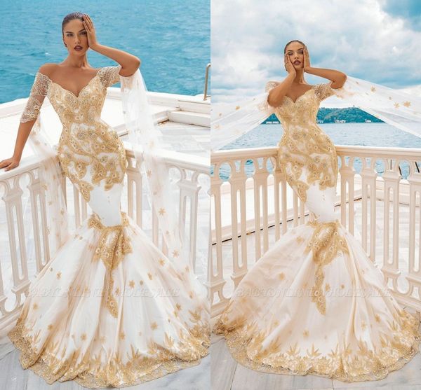 gold appliques embroidery mermaid wedding dresses 2021 arabic elegant off shoulder long sleeve beaded backless long trumpet bridal gowns, White
gold appliques embroidery mermaid wedding dresses 2021 arabic elegant off shoulder long sleeve beaded backless long trumpet bridal gowns, White