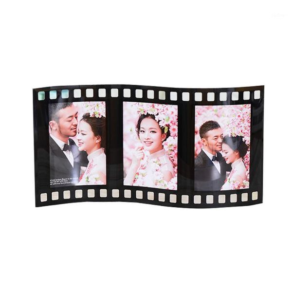 creative cinefilm shaped deskp frame glass picture frame with three boxes gpf005-31 
creative cinefilm shaped deskp frame glass picture frame with three boxes gpf005-31