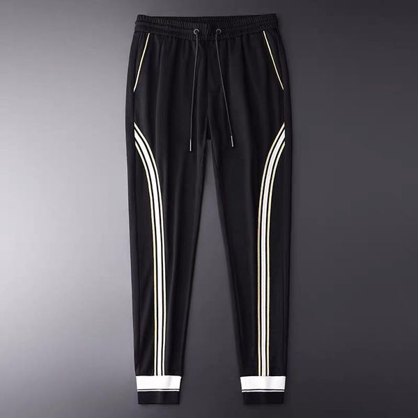 новая весна легкие трикотажные drawstring штаны мужская мода контрастные цвета ленты повседневный спортивные штаны, Black;blue 
новая весна легкие трикотажные drawstring штаны мужская мода контрастные цвета ленты повседневный спортивные штаны, Black;blue