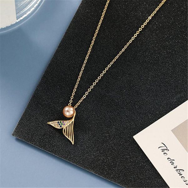 zirconia mermaid tail pendant necklace for women elegant clavicle chain simulated pearl necklace fashion accessories, Silver
zirconia mermaid tail pendant necklace for women elegant clavicle chain simulated pearl necklace fashion accessories, Silver