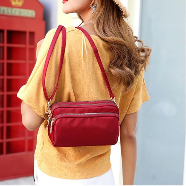 корейский мать плеча сумки сплошной цвет многослойные crossbody сумки для путешествий сумки посланника водонепроницаемый нейлон ткань сумка
корейский мать плеча сумки сплошной цвет многослойные crossbody сумки для путешествий сумки посланника водонепроницаемый нейлон ткань сумка