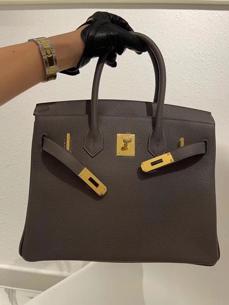 fully handmade brand bag 30cm togo leather gris etain trench colors wax line stitching silver or gold hardware inspired handbag
fully handmade brand bag 30cm togo leather gris etain trench colors wax line stitching silver or gold hardware inspired handbag