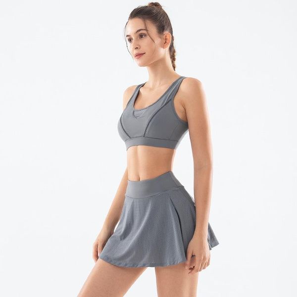 2021 women's quick dry yoga set sleeveless hollow out bra vest high waist short skirt tights two piece set, White;red
2021 women's quick dry yoga set sleeveless hollow out bra vest high waist short skirt tights two piece set, White;red