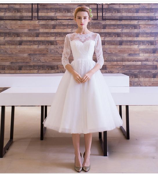 white long sleeves tulle ball gown wedding dresses with lace appliques 2021 tea length bridal gowns
white long sleeves tulle ball gown wedding dresses with lace appliques 2021 tea length bridal gowns