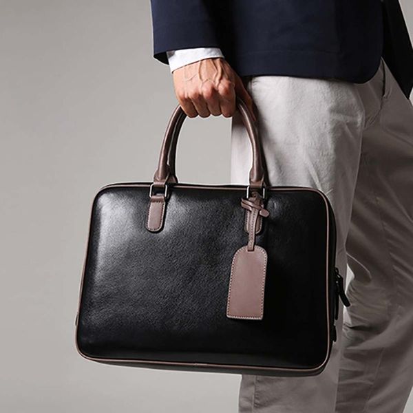 men's briefcase business handbag pu leathar large capacity lapbag a4 magazine and document storage portable office bag
men's briefcase business handbag pu leathar large capacity lapbag a4 magazine and document storage portable office bag