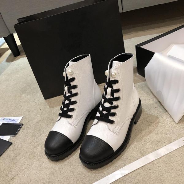 winter ladies high-heeled boots pearl decoration round-toe high-heeled boots black and white fashion short
winter ladies high-heeled boots pearl decoration round-toe high-heeled boots black and white fashion short