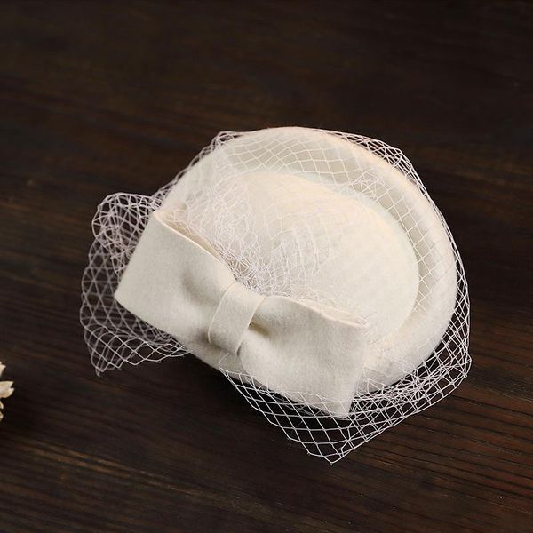 stingy brim hats high end custom british woollen hat autumn winter vintage bow felt lady lace mesh beret party wedding, Blue;gray
stingy brim hats high end custom british woollen hat autumn winter vintage bow felt lady lace mesh beret party wedding, Blue;gray