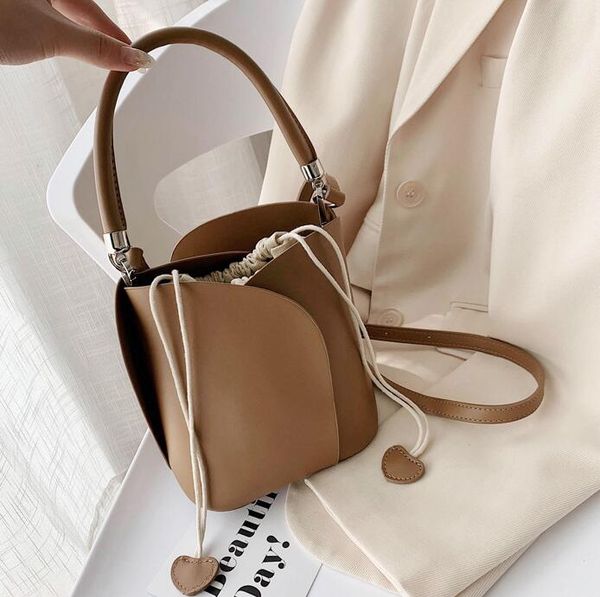 ковш мода женщины сумка плеча кожи высокого качества мини-сумка lady crossbody холст сумка
ковш мода женщины сумка плеча кожи высокого качества мини-сумка lady crossbody холст сумка