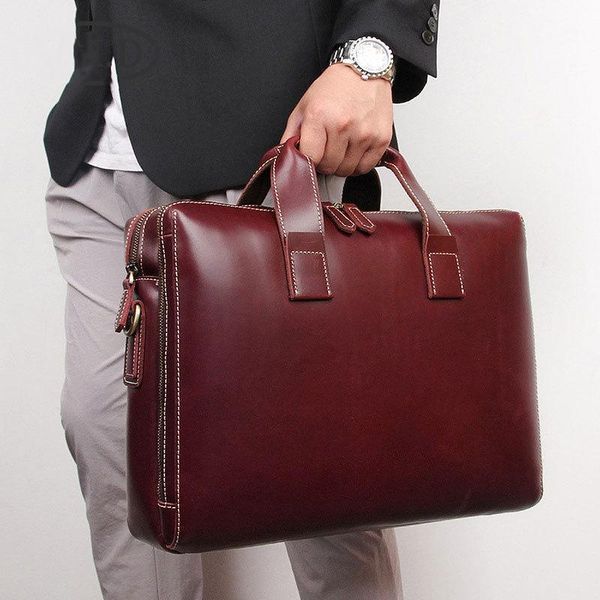 2021 new simple real leather business briefcase bag office solid color 15 inch lapbag layer cowhide men's handbag ld9061
2021 new simple real leather business briefcase bag office solid color 15 inch lapbag layer cowhide men's handbag ld9061