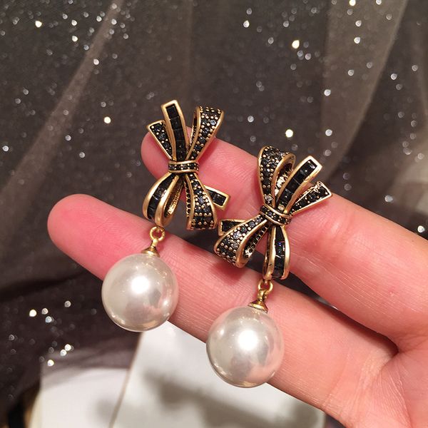 pearl bow earrings super immortal retro atmosphere sweet and elegant s925 silver needle autumn and winter bronze petal earrings
pearl bow earrings super immortal retro atmosphere sweet and elegant s925 silver needle autumn and winter bronze petal earrings