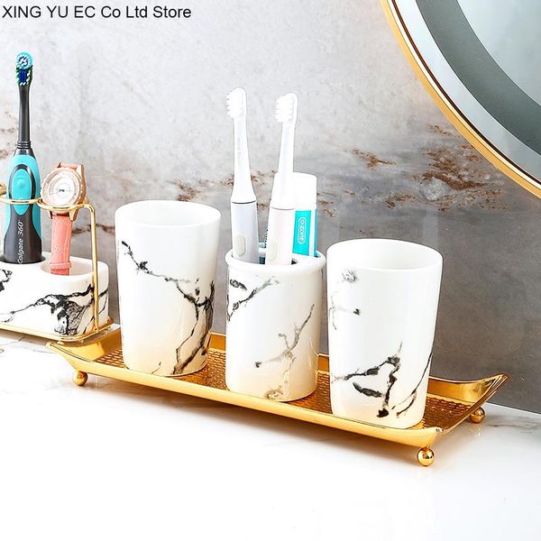 bath accessory set nordic black and white ceramic mouthwash cup household golden iron storage tray simple bathroom decoration accessories
bath accessory set nordic black and white ceramic mouthwash cup household golden iron storage tray simple bathroom decoration accessories