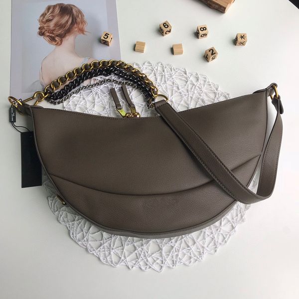 2020 new women's fashion high sense canvas backpack with cowhide simple versatile metal chain hand-held messenger bag waist bag women&#
2020 new women's fashion high sense canvas backpack with cowhide simple versatile metal chain hand-held messenger bag waist bag women&#